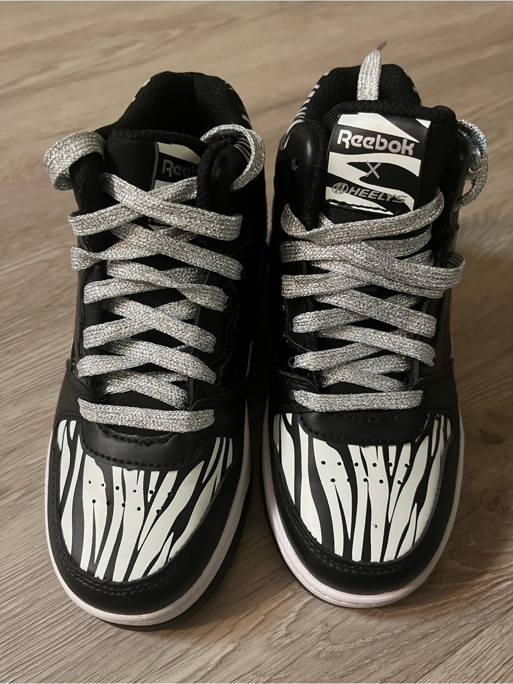 Reebok Kids Black & White Zebra Heelys Sneakers with Glitter Laces